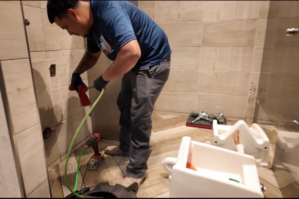 Drain Connection Home 25 Urinal and Sewer Line Descaling in Downtown Austin, Texas